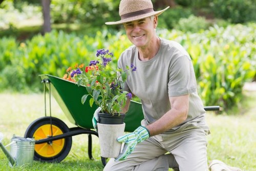 Gardeners Addiscombe working on soil, planting, and garden health